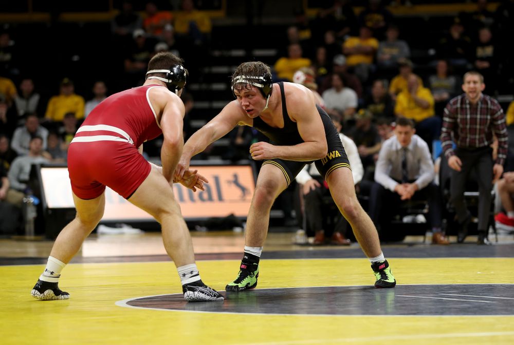 IowaÕs Jacob Warner wrestles WisconsinÕs Taylor Watkins at 197 pounds Sunday, December 1, 2019 at Carver-Hawkeye Arena. Warner won the match 5-2. (Brian Ray/hawkeyesports.com)