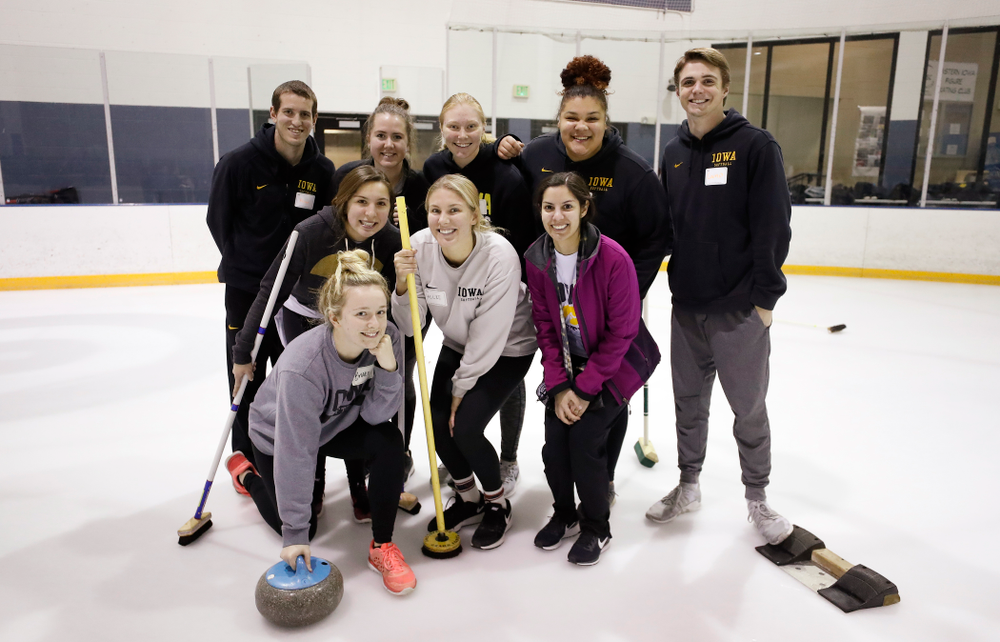 Members of the Iowa Softball team learn the sport of curling as part of a team building event Wednesday, January 10, 2018 at the Cedar Rapids Ice Arena. (Brian Ray/hawkeyesports.com)