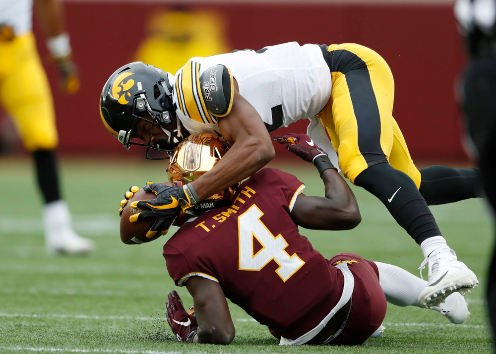 Iowa Hawkeyes wide receiver Brandon Smith (12) makes a catch against the Minnesota Golden Gophers Saturday, October 6, 2018 at TCF Bank Stadium. (Brian Ray/hawkeyesports.com)
