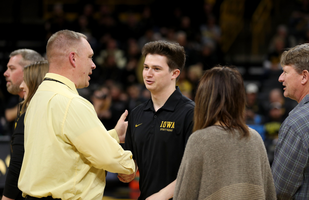The Iowa Cheerleaders and Dance Team perform on senior night at half-time of the Iowa Hawkeyes game against the Purdue Boilermakers Tuesday, March 3, 2020 at Carver-Hawkeye Arena. (Brian Ray/hawkeyesports.com)