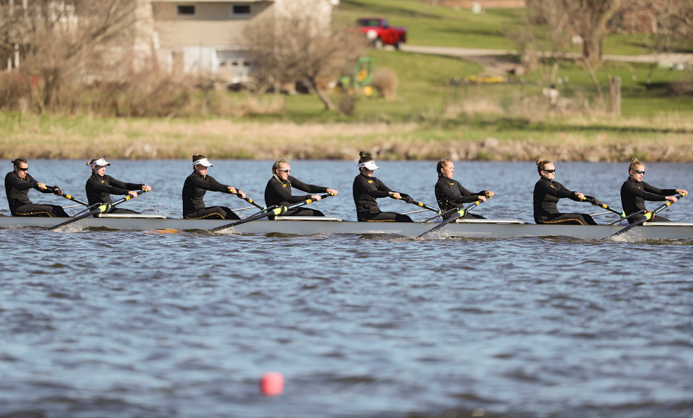 Iowa's Rachel Kram (from left), Lauren Collier, Noelle Ossenkop, Erika Davidson, Riley Seufert, Molly Rygh, Kirsten Jurgersen, and Amelia Juhl during their I Novice 8 race against Wisconsin in their Big Ten Double Dual Rowing Regatta at Lake Macbride in Solon on Saturday, Apr. 13, 2019. (Stephen Mally/hawkeyesports.com)