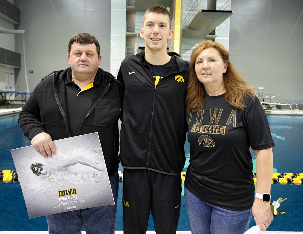 Iowa’s Steve Fiolic is honored on senior day before their meet at the Campus Recreation and Wellness Center in Iowa City on Friday, February 7, 2020. (Stephen Mally/hawkeyesports.com)
