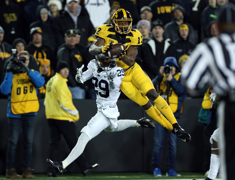 Iowa Hawkeyes wide receiver Brandon Smith (12) catches a touchdown pass against the Penn State Nittany Lions Saturday, October 12, 2019 at Kinnick Stadium. (Brian Ray/hawkeyesports.com)