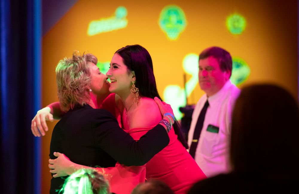 Iowa Hawkeyes forward Megan Gustafson (10) hugs head coach Lisa Bluder after being selected by the Dallas Wings in the second round of the 2019 WNBA Draft Wednesday, April 10, 2019 at Nike New York Headquarters in New York City. (Brian Ray/hawkeyesports.com)