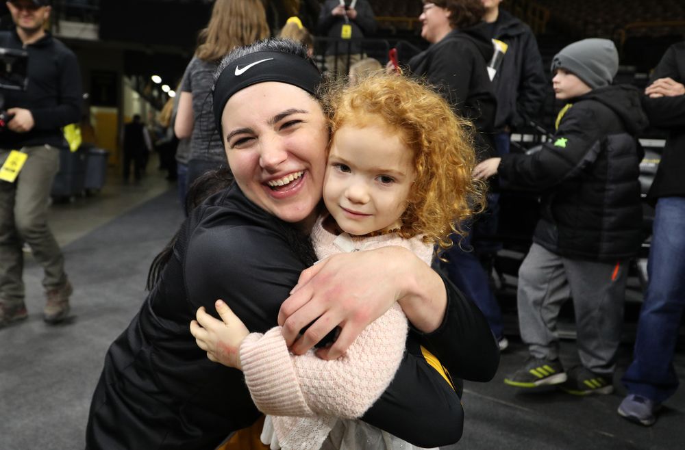 Iowa Hawkeyes forward Megan Gustafson (10) takes, photos, signs autographs, and gives hugs following senior day ceremonies Sunday, March 3, 2019 at Carver-Hawkeye Arena. (Brian Ray/hawkeyesports.com)