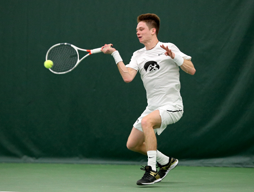 Iowa’s Jason Kerst returns a shot during his singles match at the Hawkeye Tennis and Recreation Complex in Iowa City on Sunday, February 16, 2020. (Stephen Mally/hawkeyesports.com)