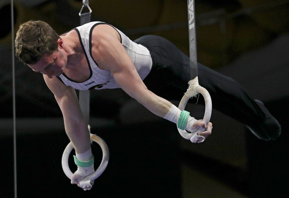 Iowa's Jake Brodarzon competes in the rings during the second day of the Big Ten Men's Gymnastics Championships at Carver-Hawkeye Arena in Iowa City on Saturday, Apr. 6, 2019. (Stephen Mally/hawkeyesports.com)
