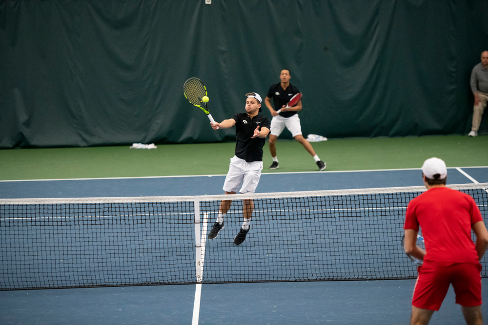 The Iowa men's tennis team competes against Cornell in The Rise Tennis Center in Ithaca, NY on Sunday, Feb. 24, 2019.