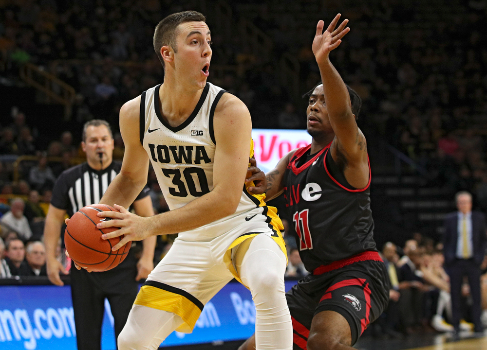 Iowa Hawkeyes guard Connor McCaffery (30) looks to pass during the first half of their game at Carver-Hawkeye Arena in Iowa City on Friday, Nov 8, 2019. (Stephen Mally/hawkeyesports.com)
