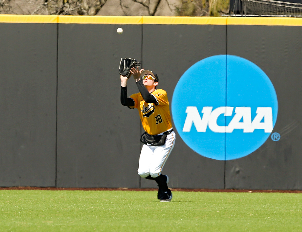 Iowa Hawkeyes left fielder Trenton Wallace (38) pulls in a fly ball for an out during the first inning against Illinois at Duane Banks Field in Iowa City on Sunday, Mar. 31, 2019. (Stephen Mally/hawkeyesports.com)