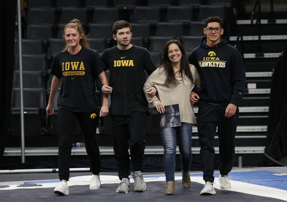 Iowa Men's Gymnast Rogelio Vazquez and his family during senior day ceremonies following their meet against the Ohio State Buckeyes Saturday, March 16, 2019 at Carver-Hawkeye Arena. (Brian Ray/hawkeyesports.com)