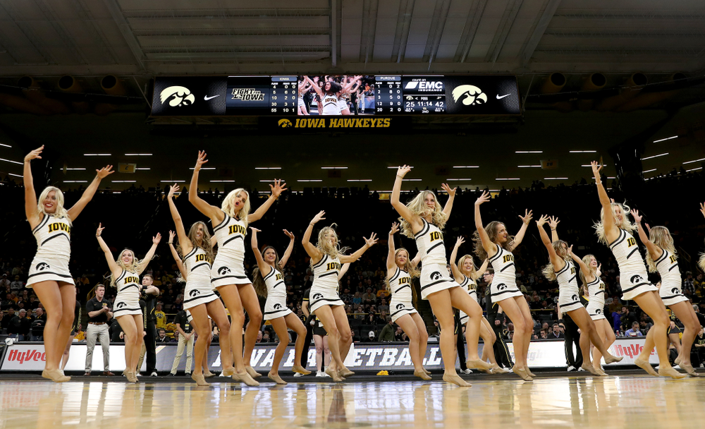 The Iowa Cheerleaders and Dance Team perform on senior night at half-time of the Iowa Hawkeyes game against the Purdue Boilermakers Tuesday, March 3, 2020 at Carver-Hawkeye Arena. (Brian Ray/hawkeyesports.com)