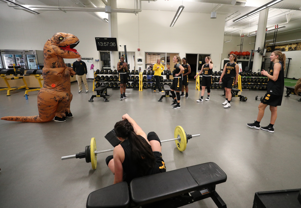 Iowa Hawkeyes head coach Lisa Bluder surprises her team during a workout dressed as a T-Rex for Halloween Wednesday, October 31, 2018 at Carver-Hawkeye Arena. (Brian Ray/hawkeyesports.com)