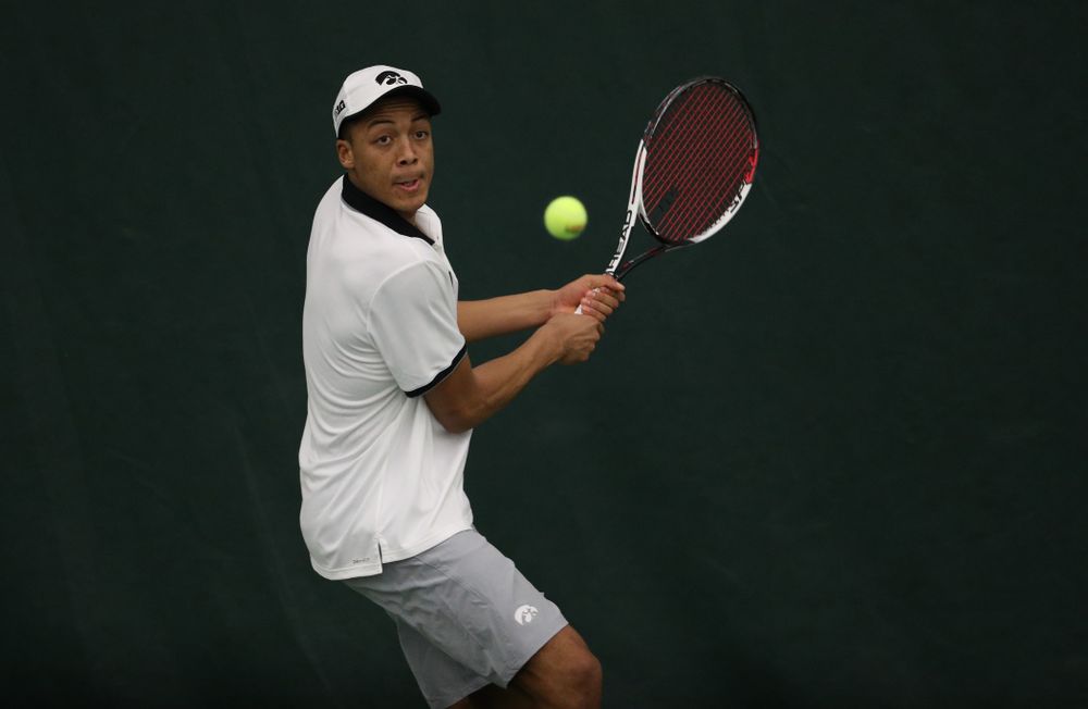 Iowa's Oliver Okonkwo against Western Michigan Saturday, January 19, 2019 at the Hawkeye Tennis and Recreation Complex. (Brian Ray/hawkeyesports.com)