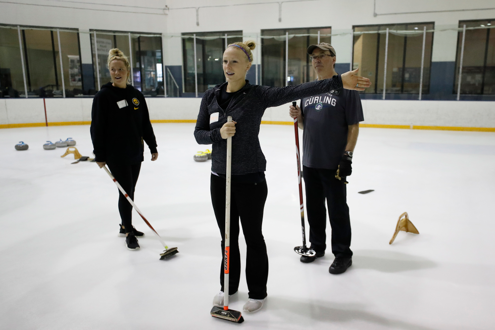 Members of the Iowa Softball team learn the sport of curling as part of a team building event Wednesday, January 10, 2018 at the Cedar Rapids Ice Arena. (Brian Ray/hawkeyesports.com)