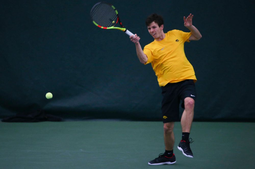 Iowa's Joe Tyler at a tennis match vs Drake Friday, March 8, 2019 at the Hawkeye Tennis and Recreation Complex. (Lily Smith/hawkeyesports.com)
