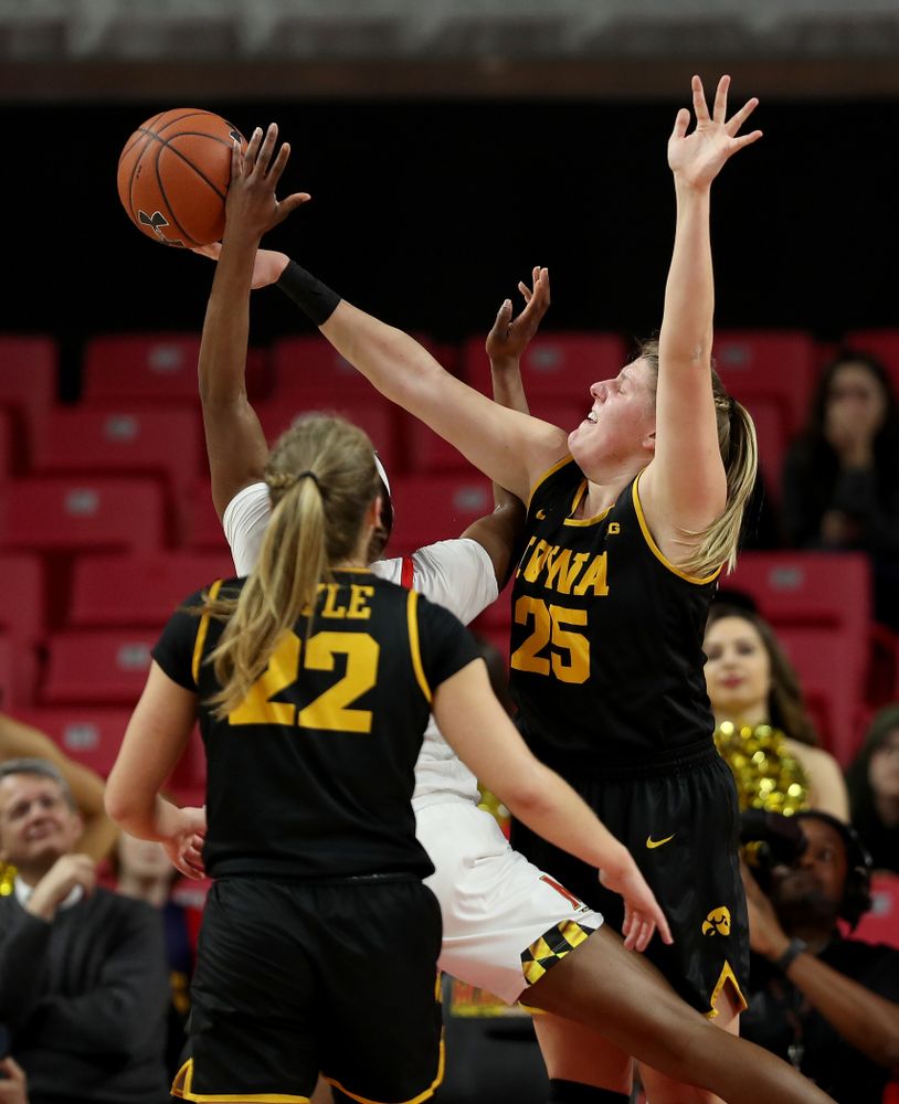 Iowa Hawkeyes forward/center Monika Czinano (25) blocks a shot against the Maryland Terrapins Thursday, February 13, 2020 at the Xfinity Center in College Park, MD. (Brian Ray/hawkeyesports.com)