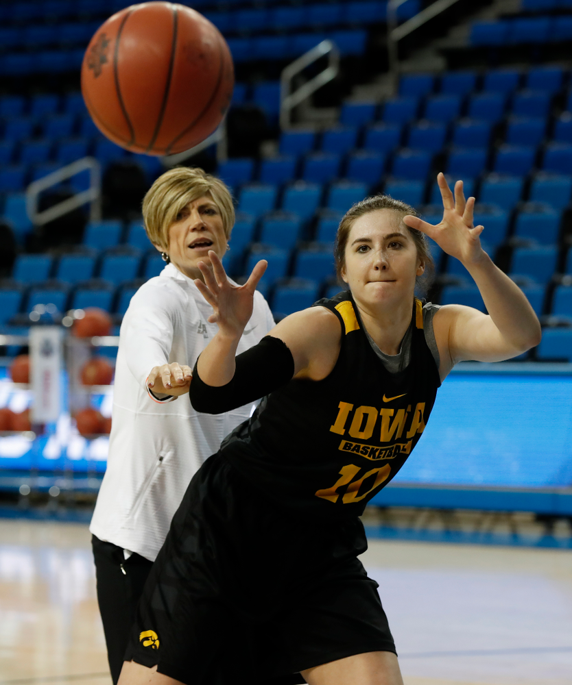 Iowa Hawkeyes forward Megan Gustafson (10) works against associate head coach Jan Jensen during practice Friday, March 16, 2018 at Pauley Pavilion on the campus of UCLA. (Brian Ray/hawkeyesports.com)