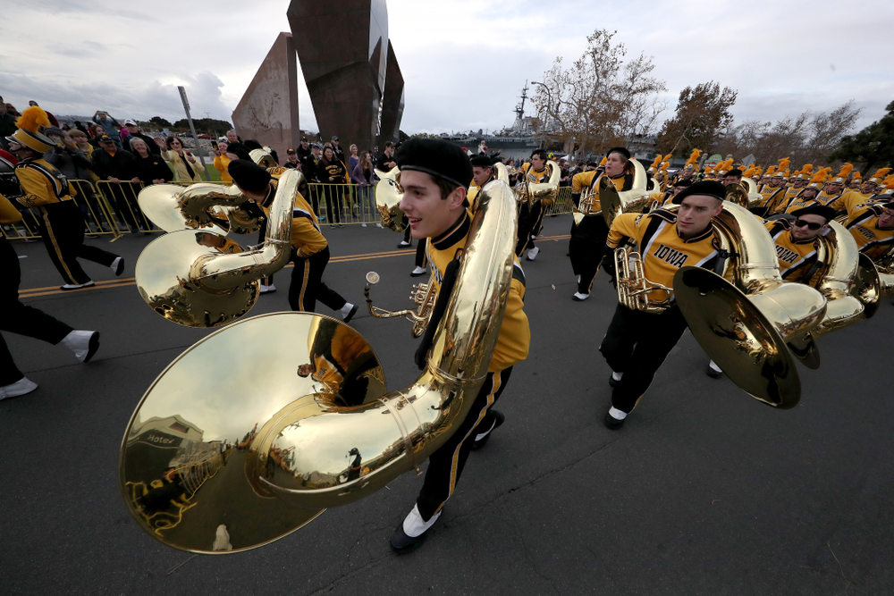 The Hawkeye Marching Band and the Iowa Spirit Squad march in the Holiday Bowl Parade Thursday, December 26, 2019 in San Diego. (Brian Ray/hawkeyesports.com)