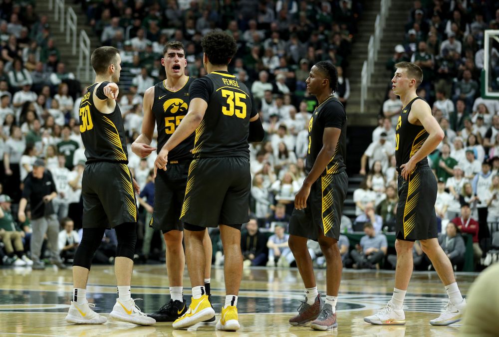 Iowa Hawkeyes guard Connor McCaffery (30), forward Luka Garza (55), forward Cordell Pemsl (35), guard Bakari Evelyn (4), and guard Joe Wieskamp (10) against Michigan State Tuesday, February 25, 2020 at the Breslin Center in East Lansing, MI. (Brian Ray/hawkeyesports.com)