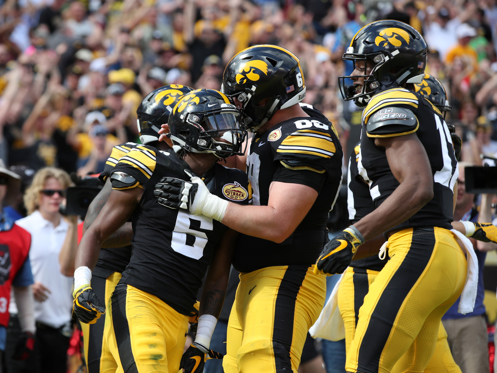 Iowa Hawkeyes wide receiver Ihmir Smith-Marsette (6) and offensive lineman Keegan Render (69) during their Outback Bowl Tuesday, January 1, 2019 at Raymond James Stadium in Tampa, FL. (Brian Ray/hawkeyesports.com)