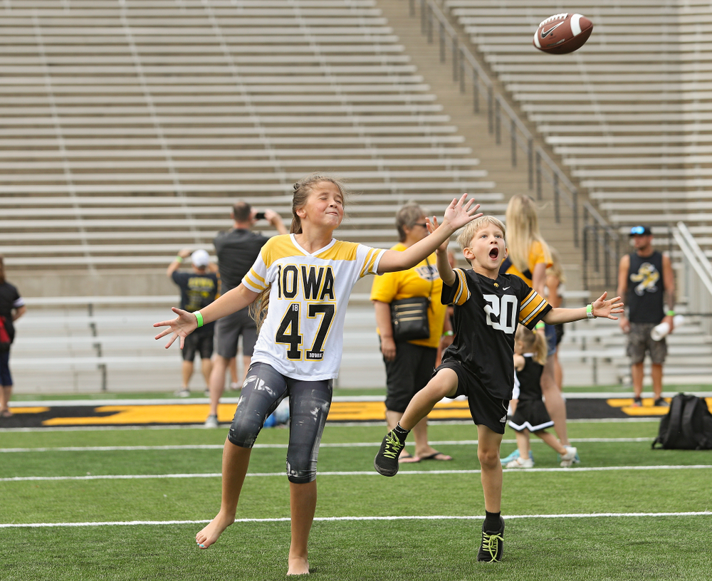 Junior Hawk Club members participate in the Swarm Experience during Kids Day at Kinnick Stadium in Iowa City on Saturday, Aug 10, 2019. (Stephen Mally/hawkeyesports.com)