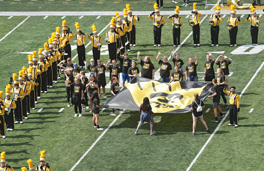 The Hawkeye Marching Band on the field as Pat Green performs “Wave on Wave” during the second quarter of their Big Ten Conference football game at Kinnick Stadium in Iowa City on Saturday, Sep 7, 2019. (Stephen Mally/hawkeyesports.com)