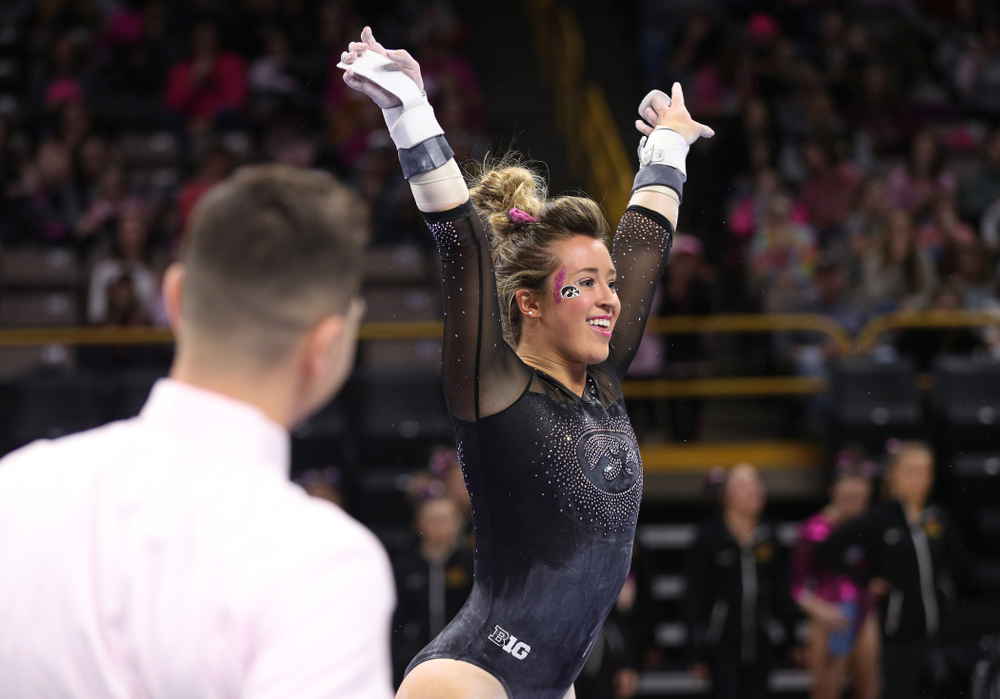 Iowa's Maddie Kampschroeder competes on the bars during their meet against the Minnesota Golden Gophers Saturday, January 19, 2019 at Carver-Hawkeye Arena. (Brian Ray/hawkeyesports.com)