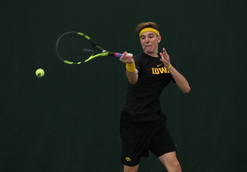 Iowa's Nikita Snezhko against UMKC Friday, February 15, 2019 at the Hawkeye Tennis and Recreation Complex. (Brian Ray/hawkeyesports.com)