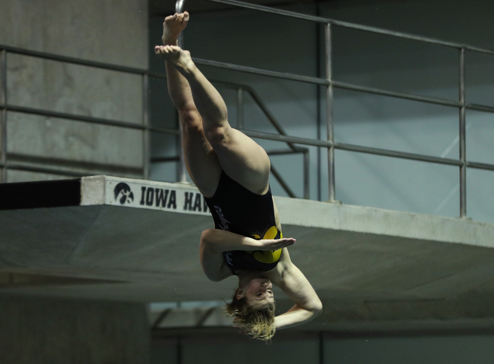 Iowa's Claire Park competes on the 1-meter springboard against the Iowa State Cyclones in the Iowa Corn Cy-Hawk Series Friday, December 7, 2018 at at the Campus Recreation and Wellness Center. (Brian Ray/hawkeyesports.com)