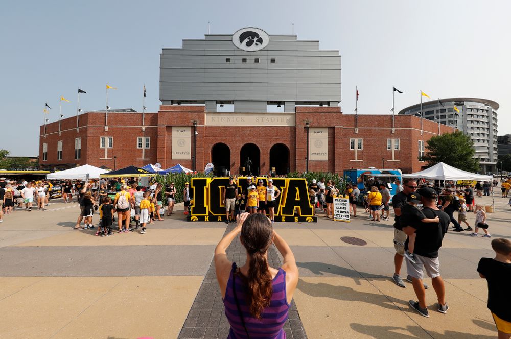Fans take photos during Kids Day Saturday, August 11, 2018 at Kinnick Stadium. (Brian Ray/hawkeyesports.com)