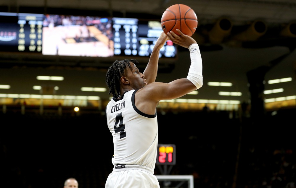 Iowa Hawkeyes guard Bakari Evelyn (4) makes a three point basket against the Maryland Terrapins Friday, January 10, 2020 at Carver-Hawkeye Arena. (Brian Ray/hawkeyesports.com)