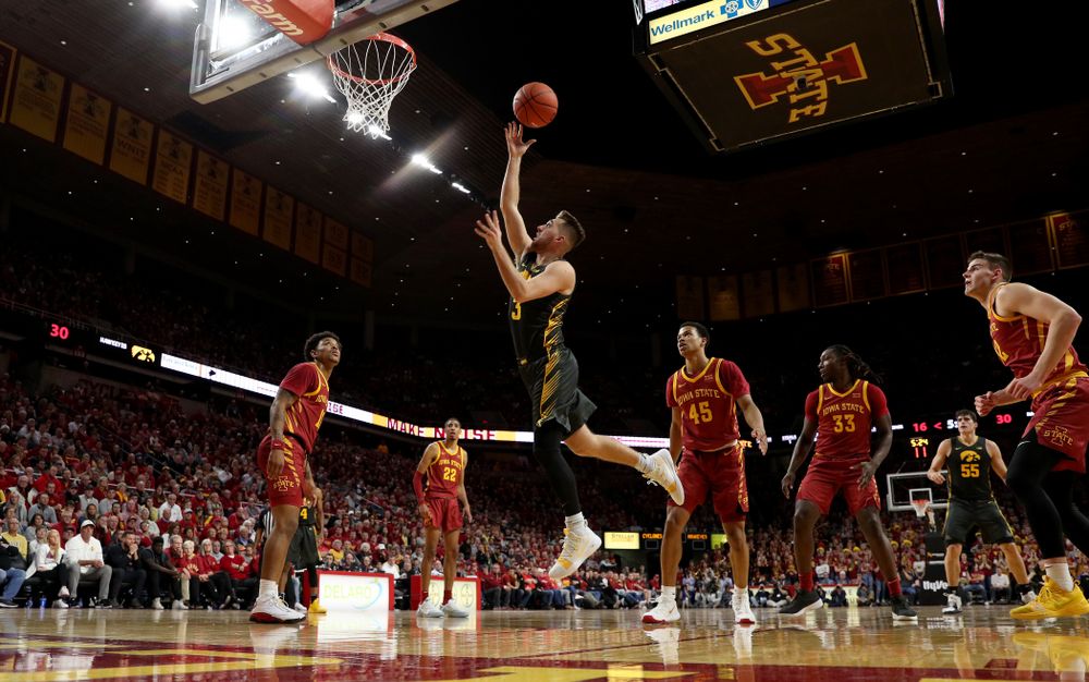 Iowa Hawkeyes guard Jordan Bohannon (3) goes to the hoop against the Iowa State Cyclones Thursday, December 12, 2019 at Hilton Coliseum in Ames, Iowa(Brian Ray/hawkeyesports.com)