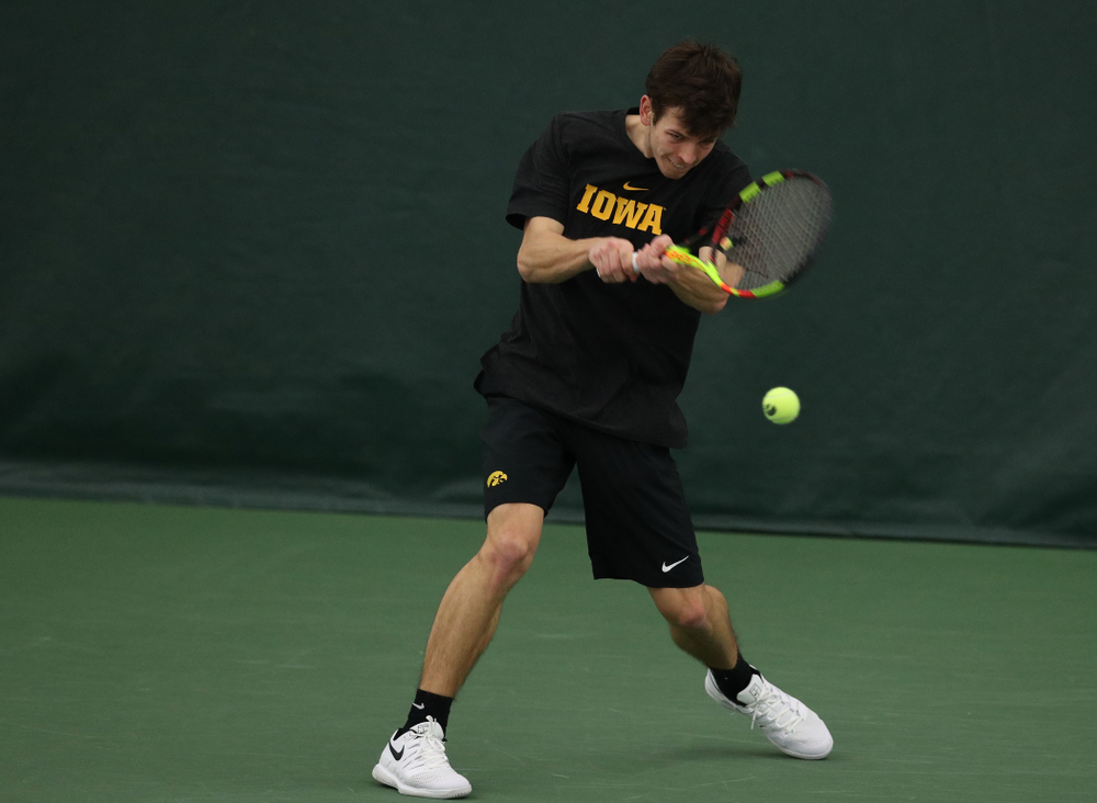 Iowa's Piotr Smietana against UMKC Friday, February 15, 2019 at the Hawkeye Tennis and Recreation Complex. (Brian Ray/hawkeyesports.com)