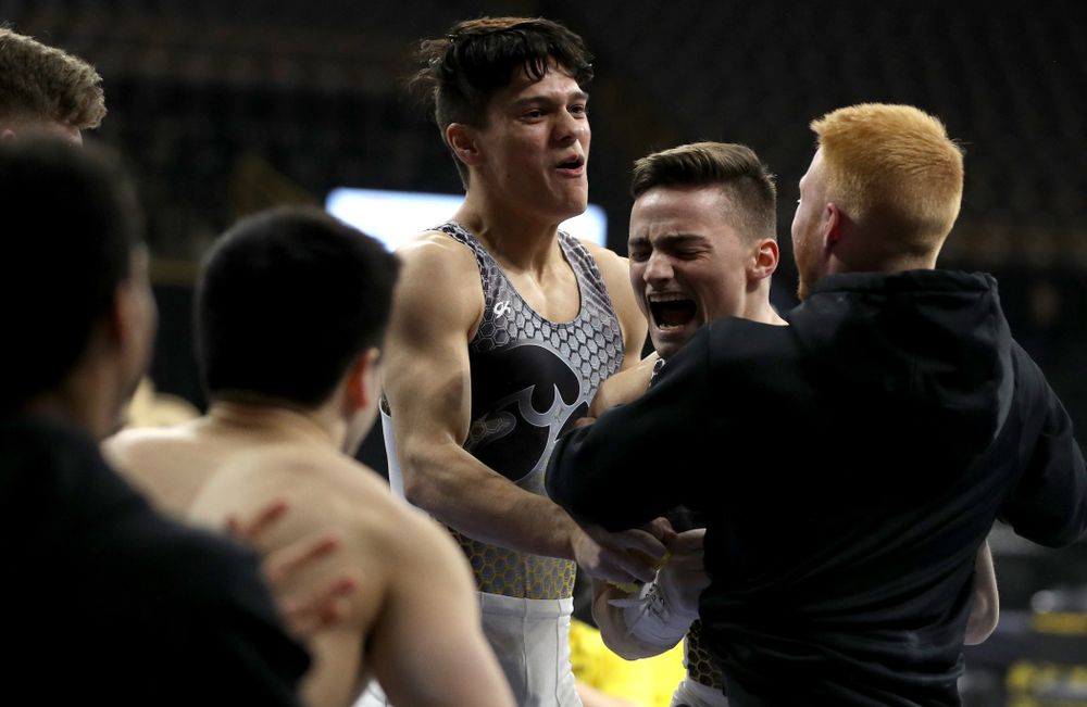 Iowa’s Mitch Mandozzi competes on the high bar against Illinois Sunday, March 1, 2020 at Carver-Hawkeye Arena. (Brian Ray/hawkeyesports.com)