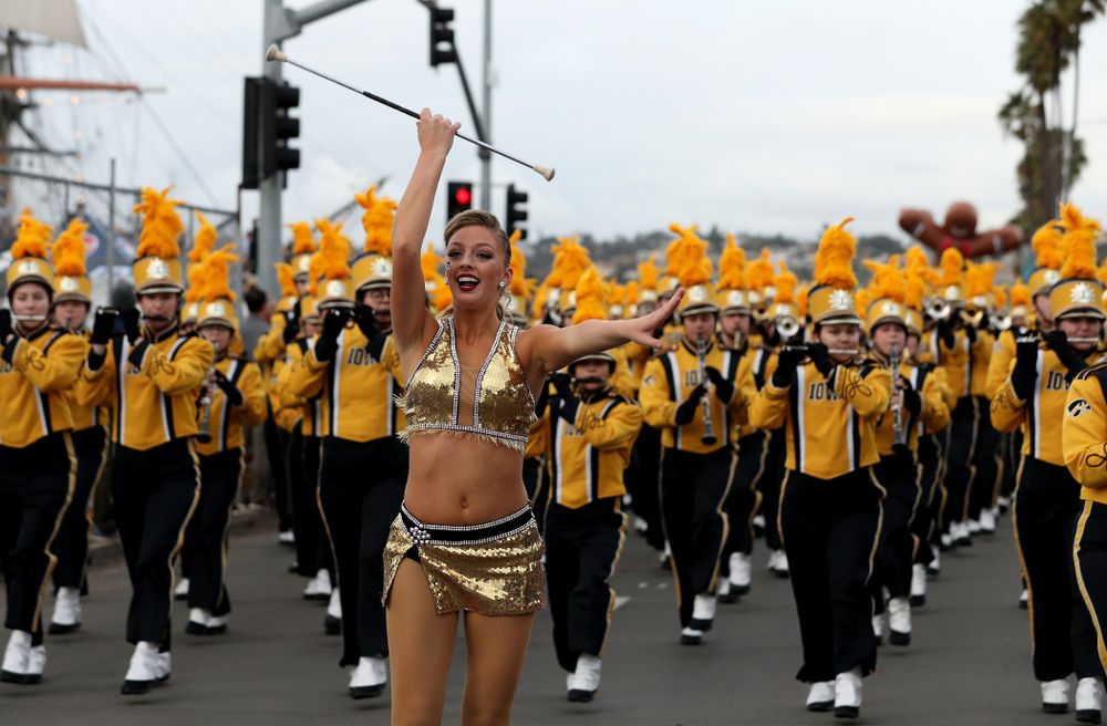 The Hawkeye Marching Band and the Iowa Spirit Squad march in the Holiday Bowl Parade Thursday, December 26, 2019 in San Diego. (Brian Ray/hawkeyesports.com)