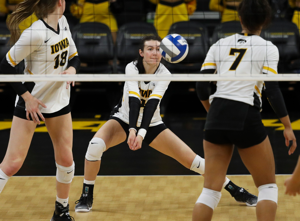 Iowa Hawkeyes defensive specialist Halle Johnston (4) digs the ball during a match against Maryland at Carver-Hawkeye Arena on November 23, 2018. (Tork Mason/hawkeyesports.com)