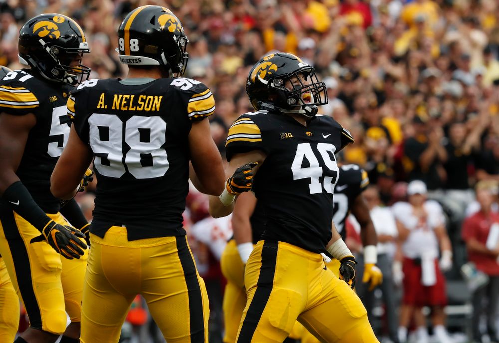Iowa Hawkeyes linebacker Nick Niemann (49) celebrates after sacking Iowa State Cyclones quarterback Kyle Kempt (17) Saturday, September 8, 2018 at Kinnick Stadium. (Brian Ray/hawkeyesports.com)