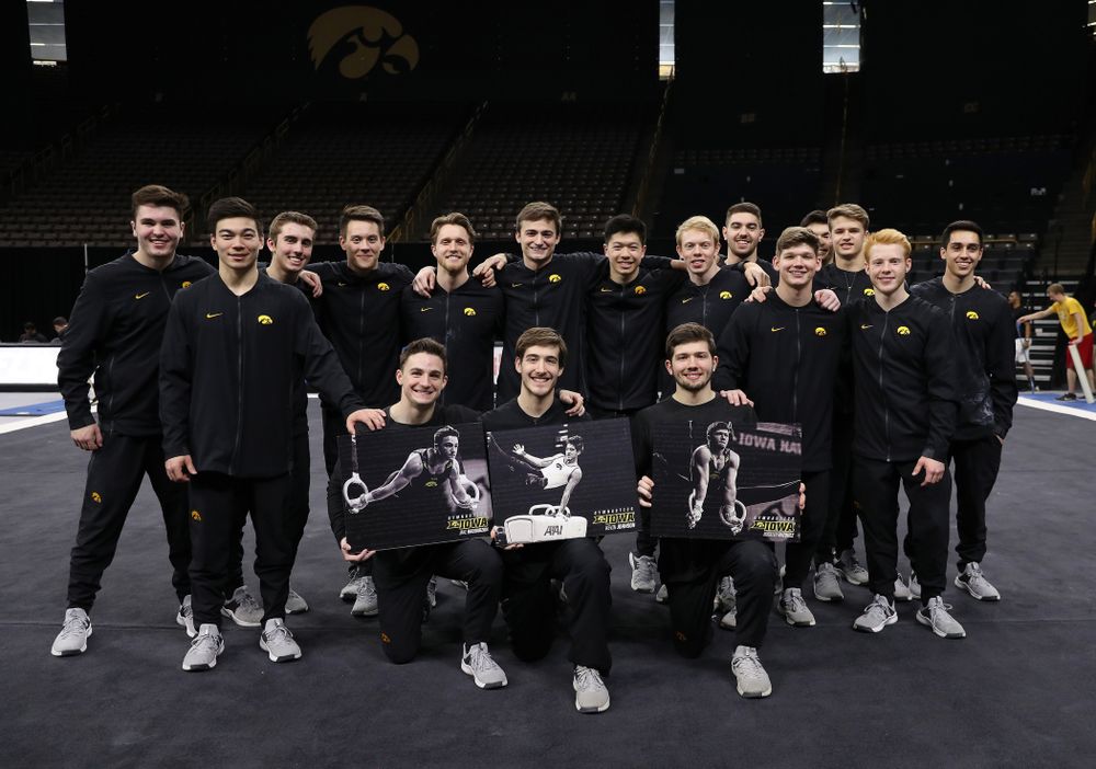 Iowa Men's Gymnastics seniors Jake Brodarzon, Kevin Johnson, and Rogelio Vazquez during senior day ceremonies following their meet against the Ohio State Buckeyes Saturday, March 16, 2019 at Carver-Hawkeye Arena. (Brian Ray/hawkeyesports.com)