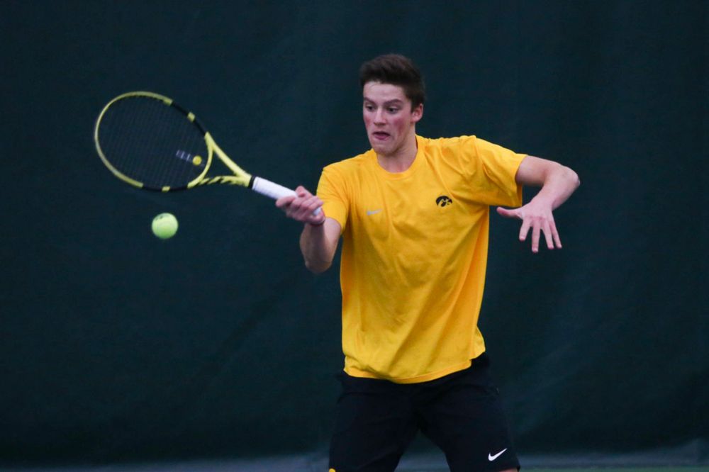 Iowa's Piotr Smietana at a tennis match vs Drake Friday, March 8, 2019 at the Hawkeye Tennis and Recreation Complex. (Lily Smith/hawkeyesports.com)