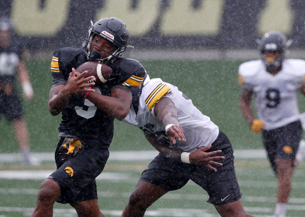 Iowa Hawkeyes wide receiver Tyrone Tracy Jr. (3) and linebacker Barrington Wade (35) during camp practice No. 15 Monday, August 20, 2018 at the Hansen Football Performance Center. (Brian Ray/hawkeyesports.com)