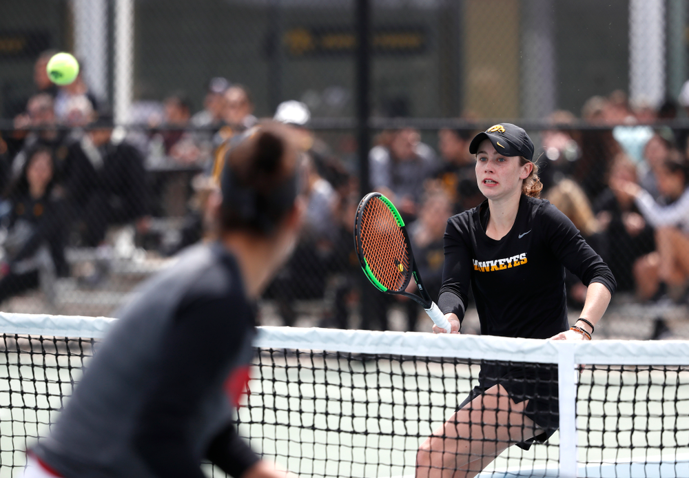 Elise Van Heuvelen and Anastasia Reimchen play a doubles match against the Wisconsin Badgers Sunday, April 22, 2018 at the Hawkeye Tennis and Recreation Center. (Brian Ray/hawkeyesports.com)