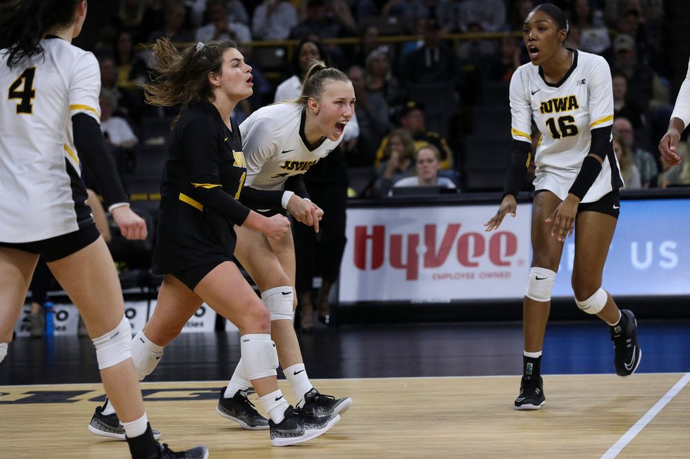 Iowa Hawkeyes defensive specialist Molly Kelly (1) and Iowa Hawkeyes outside hitter Cali Hoye (14) celebrate after winning a point during a match against Penn State at Carver-Hawkeye Arena on November 3, 2018. (Tork Mason/hawkeyesports.com)