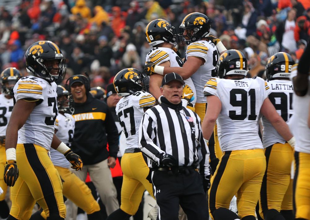 Iowa Hawkeyes defensive end A.J. Epenesa (94) celebrates with defensive end Sam Brincks (90) after blocking a punt against the Illinois Fighting Illini Saturday, November 17, 2018 at Memorial Stadium in Champaign, Ill. (Brian Ray/hawkeyesports.com)