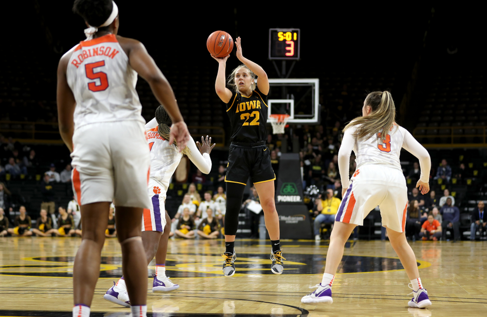 Iowa Hawkeyes guard Kathleen Doyle (22) knocks down a three point basket against Clemson Wednesday, December 4, 2019 at Carver-Hawkeye Arena. (Brian Ray/hawkeyesports.com)