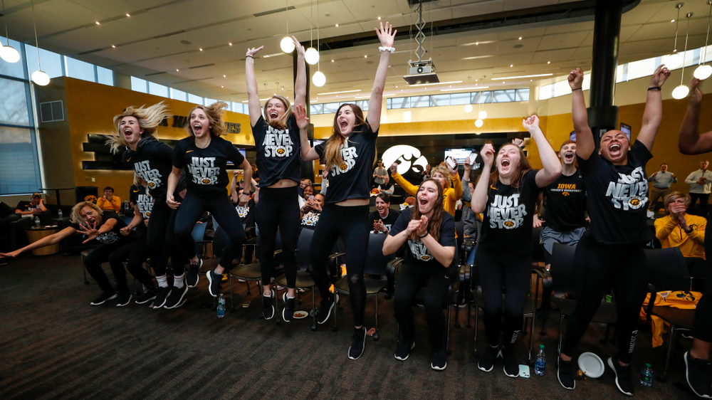 The Iowa Hawkeyes celebrate after finding out their seed in the 2018 NCAA Women's Basketball Tournament