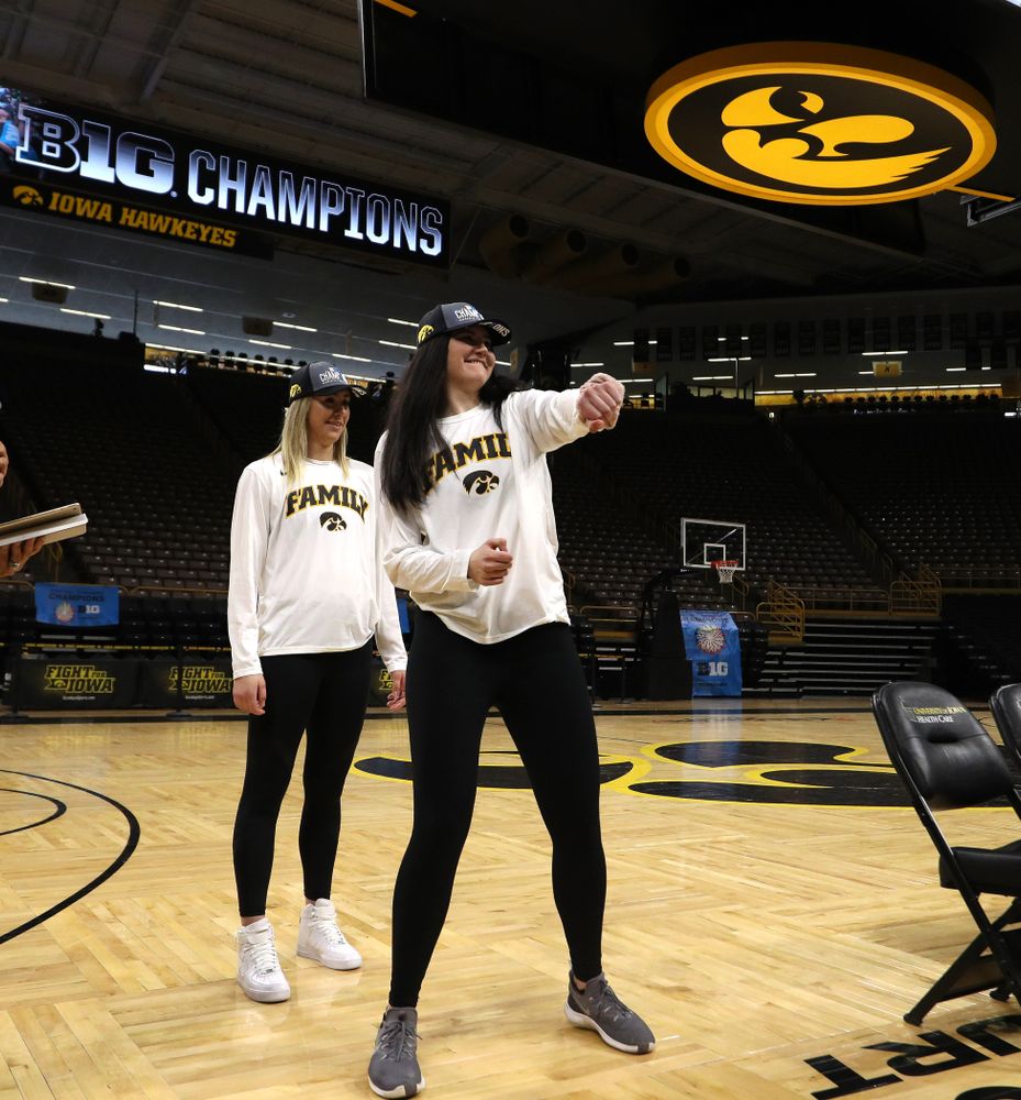Iowa Hawkeyes forward Megan Gustafson (10) and forward Hannah Stewart (21) during a celebration of their Big Ten Women's Basketball Tournament championship Monday, March 18, 2019 at Carver-Hawkeye Arena. (Brian Ray/hawkeyesports.com)