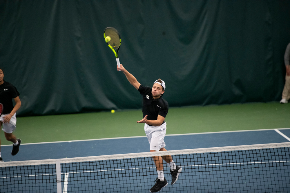 The Iowa men's tennis team competes against Cornell in The Rise Tennis Center in Ithaca, NY on Sunday, Feb. 24, 2019.