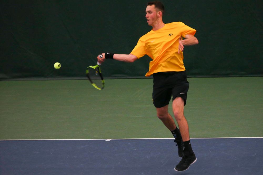 Iowa's Kareem Allaf at a tennis match vs Drake Friday, March 8, 2019 at the Hawkeye Tennis and Recreation Complex. (Lily Smith/hawkeyesports.com)