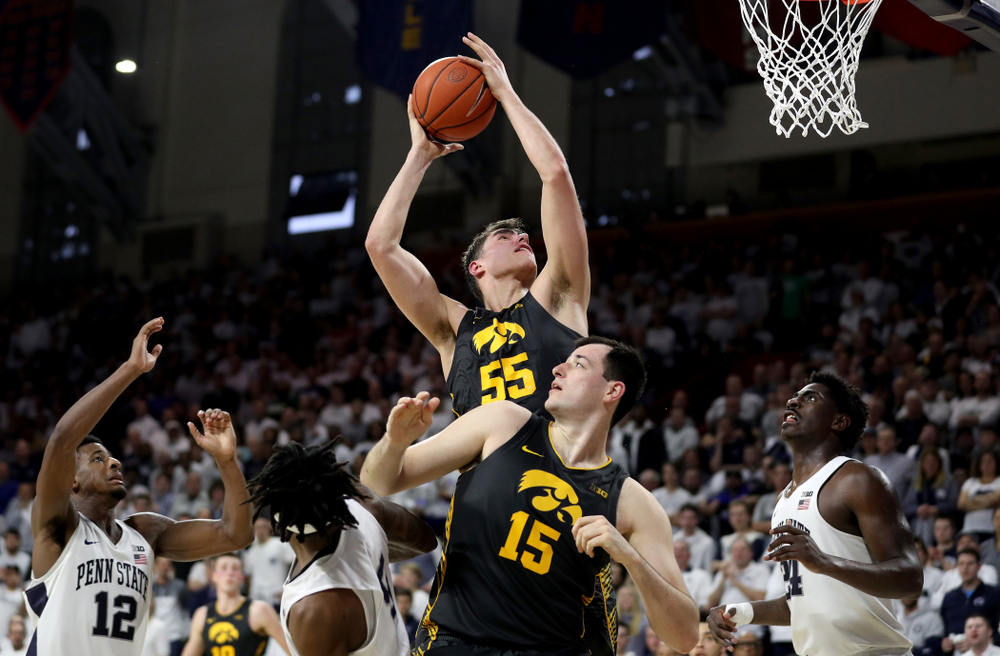 Iowa Hawkeyes forward Luka Garza (55) grabs a rebound against Penn State Saturday, January 4, 2020 at the Palestra in Philadelphia. (Brian Ray/hawkeyesports.com)